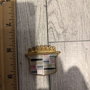 Cadillac Gold and Multicolor Emblem